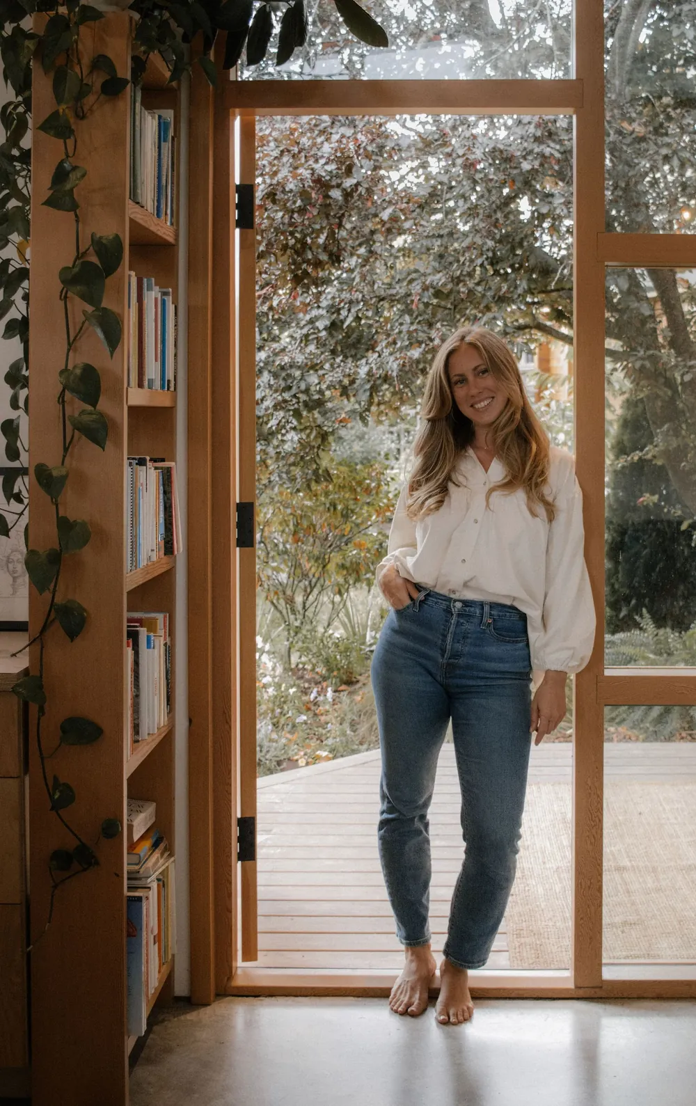 Emily Deslaurier standing in a doorway
